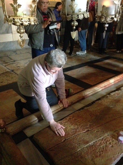 Margarita at the stone where Jesus body was laid Margarita at the stone where Jesus body was laid